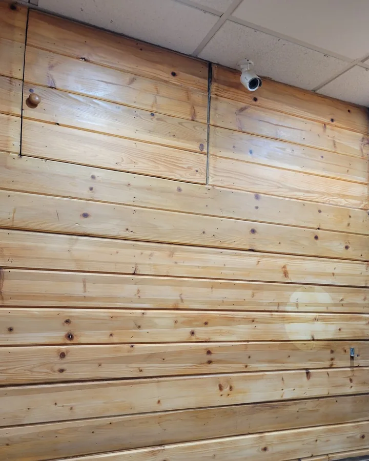 Site photo: a finished pine wall in a restaurant.
